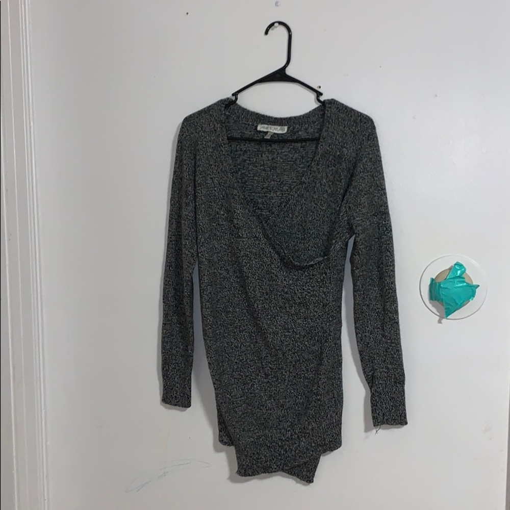 Black and white criss cross long sleeved shirt.